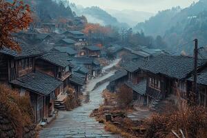 Misty mountain village with traditional houses and stone path. photo