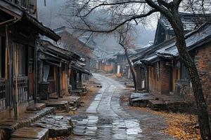 Misty village street with traditional houses. photo