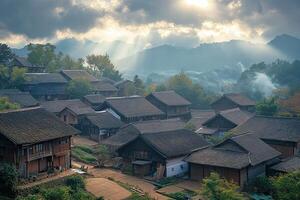 Sunbeams illuminate a mountain village with traditional houses. photo