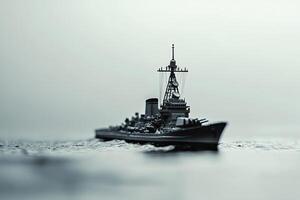 A detailed model of a battleship on calm waters. photo