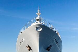 A large ship's bow against a clear blue sky. photo