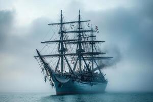 A majestic ship navigating through foggy waters. photo