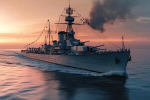 A battleship sailing at sunset with smoke billowing. photo