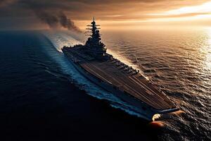 A battleship sailing through the ocean at sunset. photo