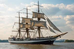 A majestic sailing ship navigating through calm waters. photo