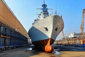 A large ship in a dry dock for repairs and maintenance. photo