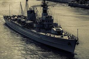 A historic ship cruising on calm waters. photo