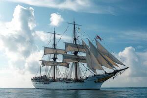 A majestic sailing ship navigating calm waters. photo