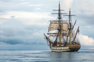 A majestic sailing ship navigating calm waters. photo