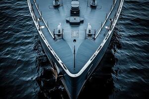 Aerial view of a sleek yacht on calm waters. photo