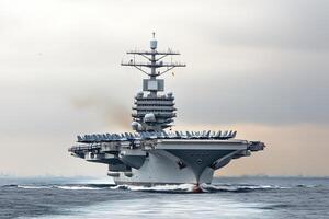 Aircraft carrier navigating through calm waters. photo