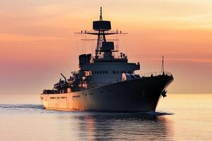 Ship navigating calm waters at sunset. photo