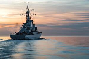 Naval ship navigating through calm waters at sunset. photo