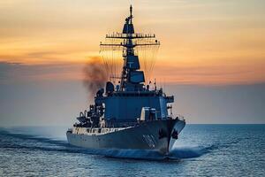 Naval ship navigating through water at sunset. photo