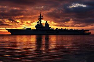 Silhouette of a ship against a vibrant sunset. photo