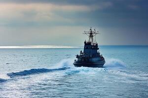 Tugboat navigating through calm waters under a cloudy sky. photo
