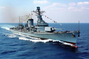 Naval ship sailing through the ocean with flags displayed. photo