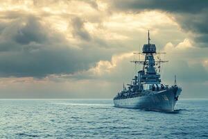 Battleship navigating through calm waters under dramatic skies. photo