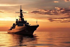 Naval ship navigating at sunset on calm waters. photo