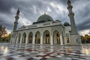 Majestic mosque under a dramatic sky, showcasing intricate architectural details and a reflective plaza. photo