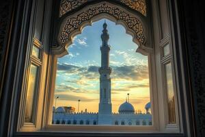 Mosque view through ornate window at sunset. photo