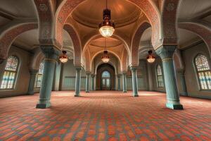 Ornate mosque interior with arches, columns, and stained glass windows. photo