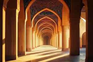 Sunlit colonnade in ancient mosque, intricate arches and columns. photo