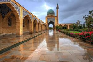 Wet stone walkway leading to a mosque with blue dome under a cloudy sky. photo