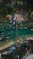 Above view of a bridge connecting two tropical islands over a narrow ocean channel. Nusa Lembongan and Nusa Ceningan in Bali. video