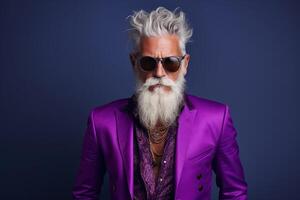 60 year old fashionable hipster man portrait on bright purple background photo