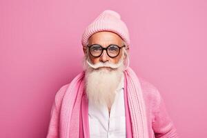 60 year old fashionable hipster man portrait on bright pink background photo
