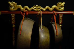 Explore beautifully crafted traditional Javanese gamelan, featuring bright colors and intricate designs, adding to the rich richness of Javanese culture. photo