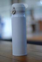 Stylish insulated water bottle mockup designed to keep drinks cold or hot while being portable for everyday use. photo