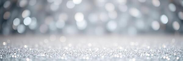 Sparkling silver background with shimmering bokeh lights creating a festive atmosphere for celebrations photo