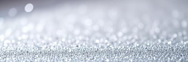 Sparkling silver texture captures light and creates a captivating visual effect in a shimmering background photo