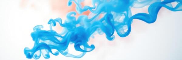 Swirling blue liquid creates an abstract pattern against a light background photo