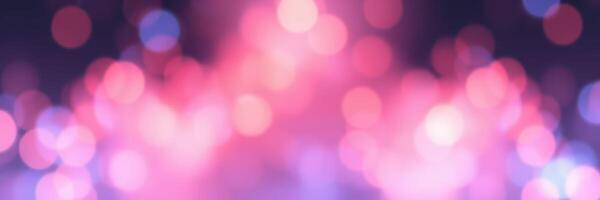 Colorful bokeh lights create a vibrant atmosphere during a nighttime celebration event in the city park photo