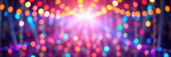 Colorful lights create a vibrant atmosphere at a festive celebration during the evening hours photo