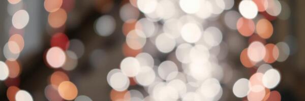Beautifully blurred festive lights create a magical atmosphere during a holiday celebration in the evening photo