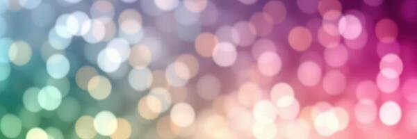 Colorful bokeh background with soft lights in various hues creating a dreamy atmosphere photo
