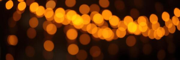 Warm golden lights create a cozy atmosphere for a festive gathering during the holiday season photo