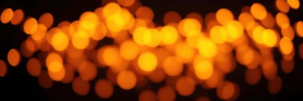 Warm golden bokeh lights create a dreamy atmosphere in a softly lit space during evening hours photo