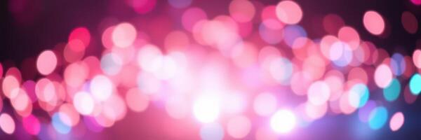 Vibrant bokeh lights create a festive atmosphere at a night event in an urban setting during early evening hours photo