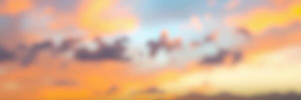 Beautiful sunset over the horizon with colorful clouds and a serene atmosphere at dusk photo