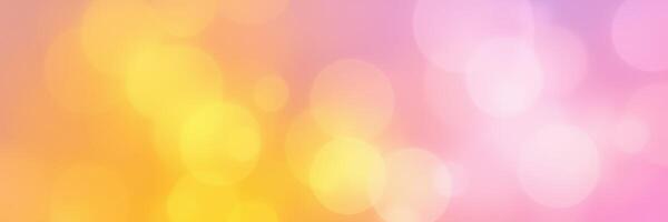 Bright and colorful bokeh background with warm yellow and pink hues for creative projects and designs photo