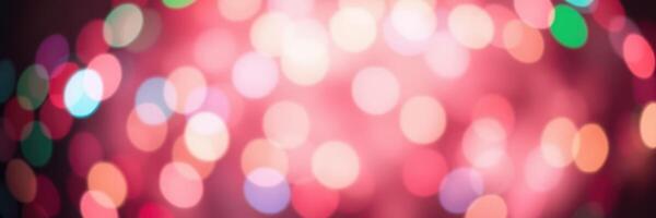 Colorful bokeh lights creating a festive atmosphere during a celebration at night photo