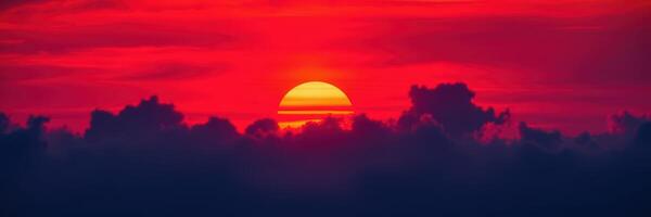 Vibrant sunset over the horizon with clouds and a colorful sky at twilight photo