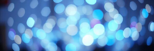 Colorful bokeh lights create a dreamy atmosphere at a nighttime event in an urban setting photo