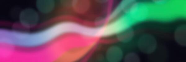 Colorful abstract waves with vibrant hues flowing in a dark background at a digital art exhibition photo