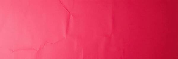 Bright pink textured background suitable for artistic or design projects featuring vibrant colors photo